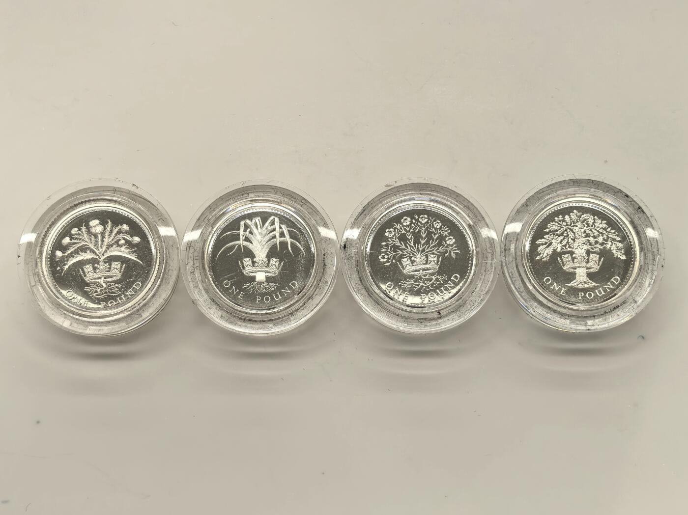 博洋堂世界钱币拍卖第146期（全场包邮） 英国1984-87年1镑精制银币4枚套装原盒证书