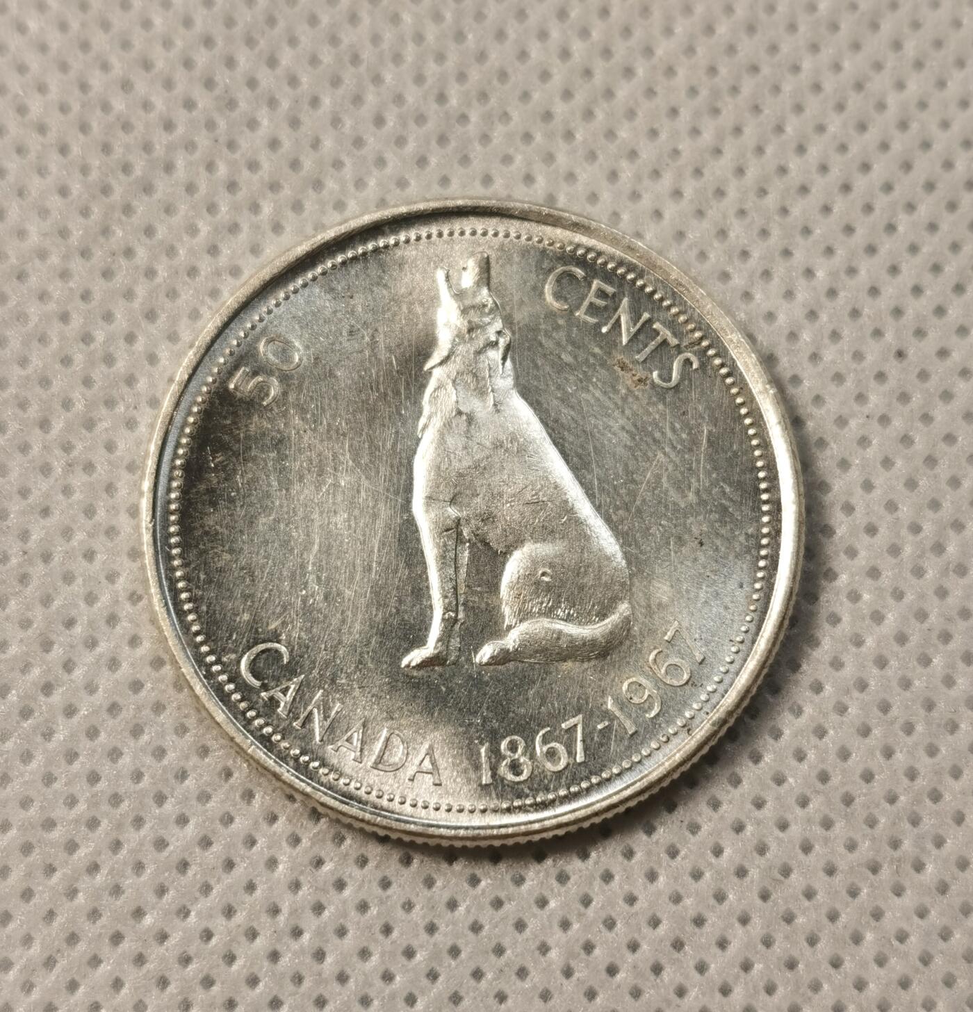 甄臻铺-世界币章拍卖（第39期）送拍享返佣金等优惠多多 加拿大独立百年狼嚎50分银币  1967 30mm 2.0mm 11.6g 80Ag