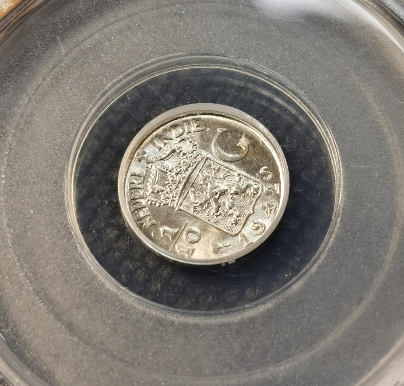 甄臻铺-世界币章拍卖（第39期）送拍享返佣金等优惠多多 公博-MS65 荷兰东印度1/10GULDEN银币 1942-S  完全未流通状态 银光闪闪 小而精