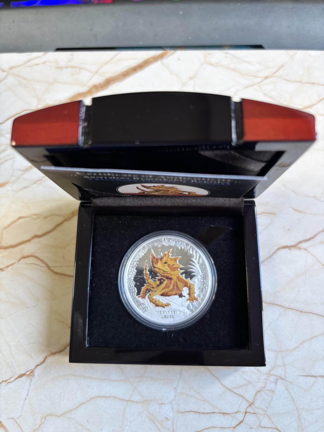 第181期拍卖 图瓦卢2014年危险动物系列棘手魔鬼蜥蜴彩色纪念银币，1盎司，999银，发行量5000枚