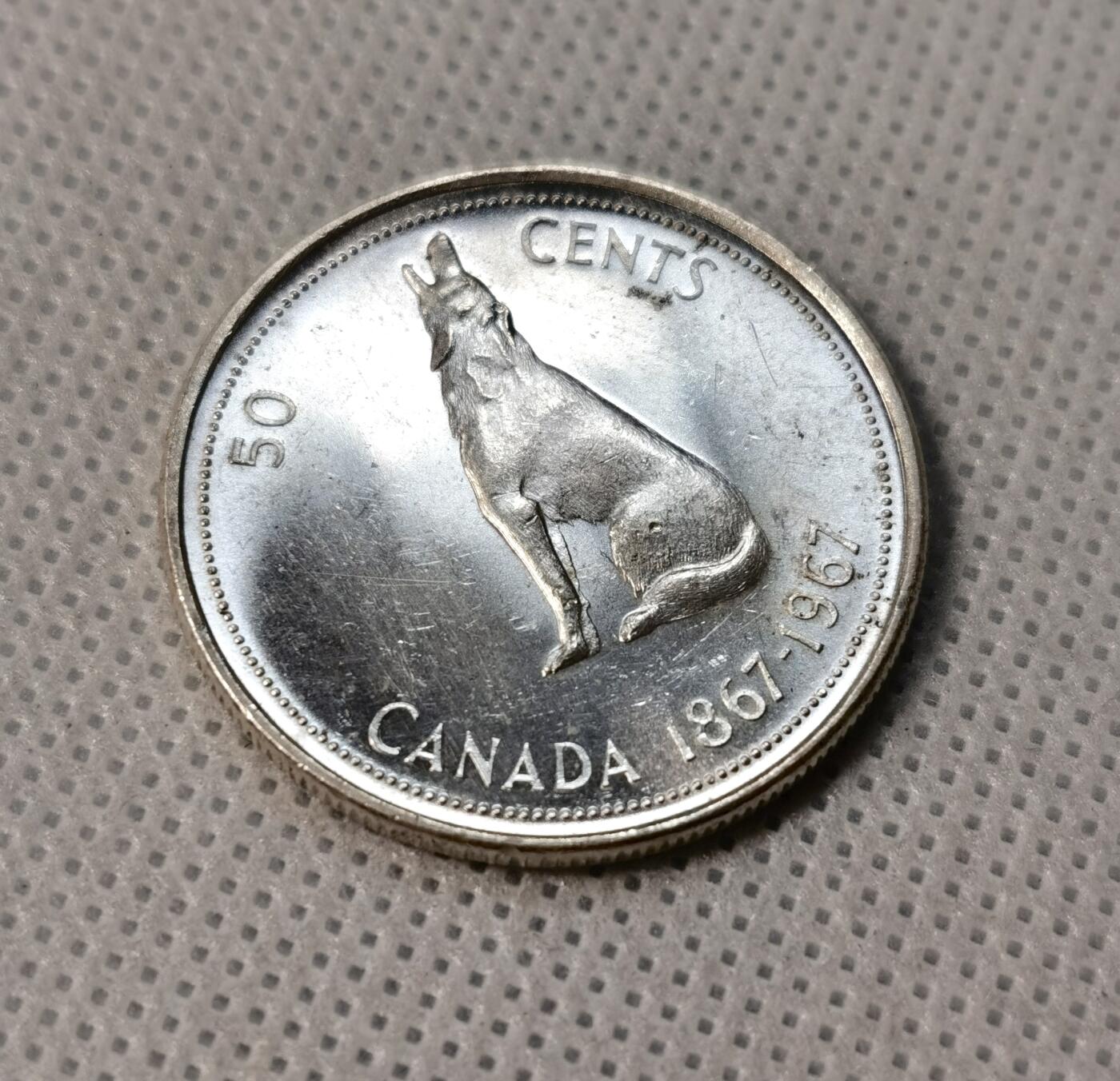 甄臻铺-世界币章拍卖（第39期）送拍享返佣金等优惠多多 加拿大独立百年狼嚎50分银币  1967 30mm 2.0mm 11.6g 80Ag