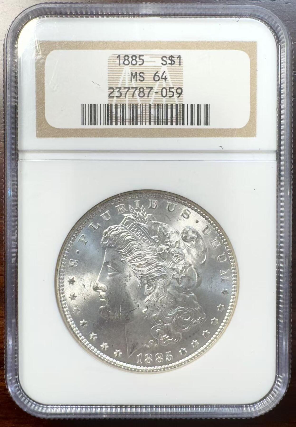 甄臻铺-世界币章拍卖（第39期）送拍享返佣金等优惠多多 NGC-MS64 1885年美国摩根，小白盒，手感不错，币面干净