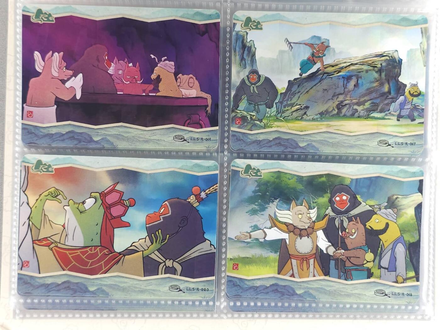 龙虎卡牌第六三场 （无佣金，周六结拍，欢迎送拍） 卡游浪浪山 pvc四宫卡册（内附浪浪山r卡44张不重复 卡册如图2 3 4，定义战损册）