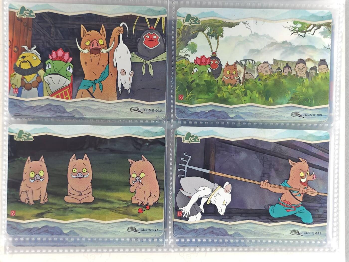 龙虎卡牌第六三场 （无佣金，周六结拍，欢迎送拍） 卡游浪浪山 pvc四宫卡册（内附浪浪山r卡44张不重复 卡册如图2 3 4，定义战损册）
