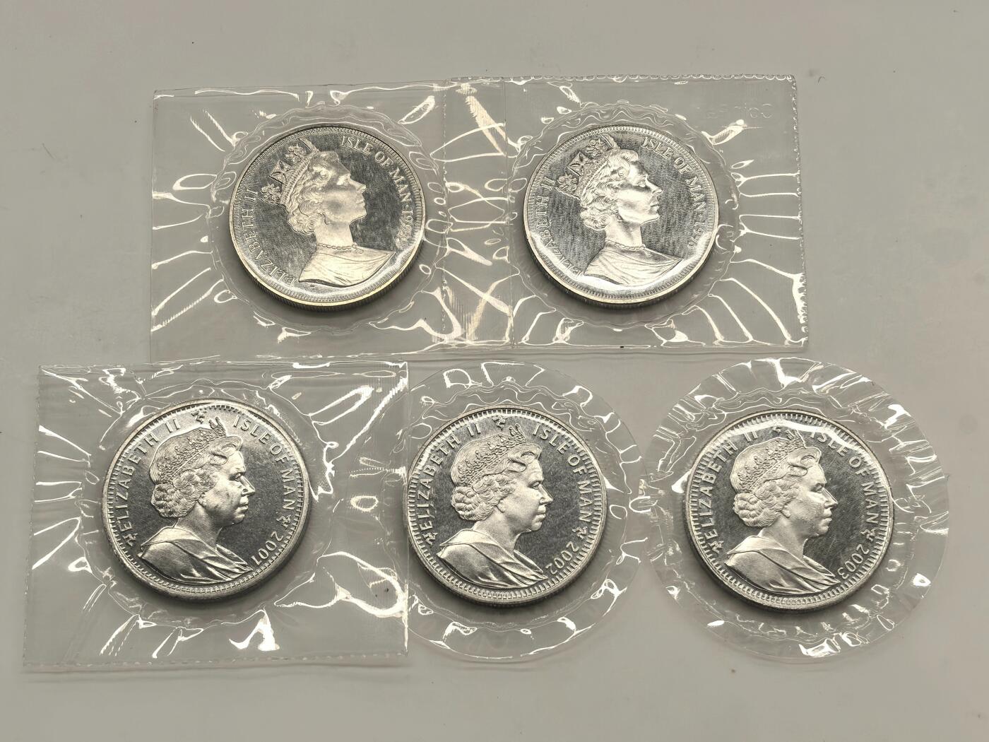 博洋堂世界钱币拍卖第146期（全场包邮） 1993、1996、2001、2002、2003年马恩岛猫铜镍币5枚一组，原厂塑封，外面的信封包装去掉了但是塑封没有打开，品相不错