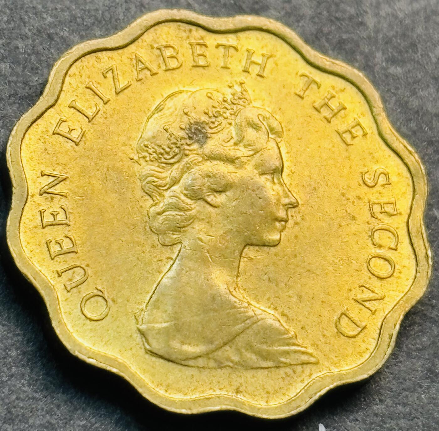 文馨钱币收藏第 281 场，【 长期接收代拍品】银元，银币，套币，纸币专场（本场截拍后休息三天，19 号发货） 原铜光品相 1980 年英属香港花边贰毫铜币，第一版