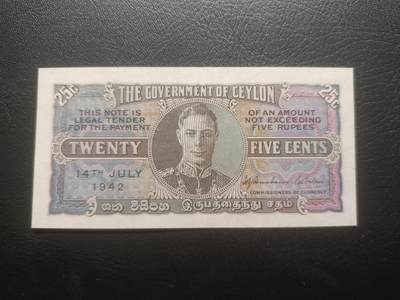 2025十一月第四期，总202期 - 英属锡兰（现斯里兰卡）1942年25分UNC-背面有痕迹，乔治六世国王，少见战时英属殖民地辅币券