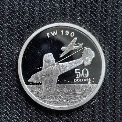 道一币馆币章第一百五十四场 - 马绍尔群岛共和国1991年战斗机系列-德国屠夫之鸟FW-190战斗机50元精制银币 31.1g 999s 25000