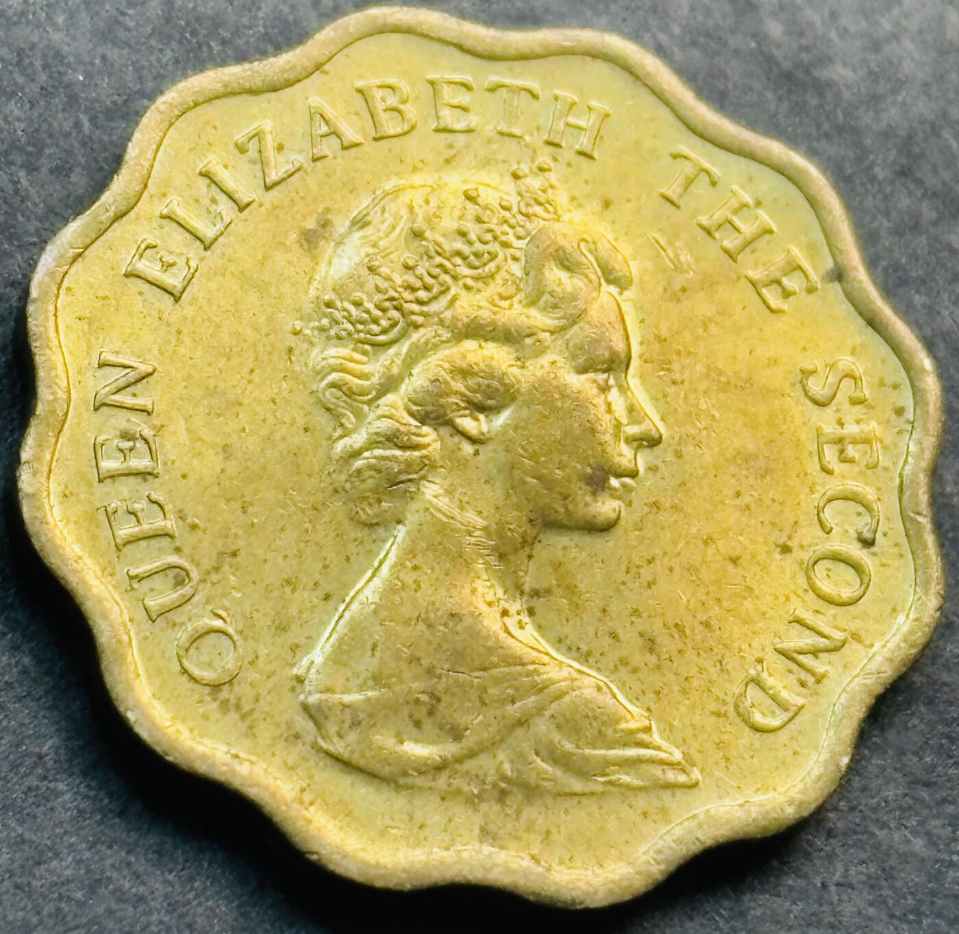 文馨钱币收藏第 281 场，【 长期接收代拍品】银元，银币，套币，纸币专场（本场截拍后休息三天，19 号发货） 原铜光品相 1975 年英属香港花边贰毫铜币，第一版首发年