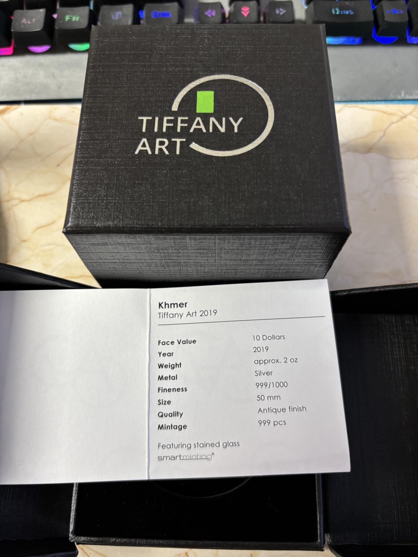 第181期拍卖 帕劳2019年蒂凡尼柬埔寨吴哥窟2盎司镶嵌玻璃银币NGC-MS70原盒证书，999银，发行999枚