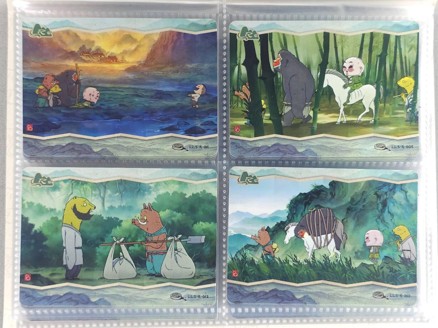 龙虎卡牌第六三场 （无佣金，周六结拍，欢迎送拍） 卡游浪浪山 pvc四宫卡册（内附浪浪山r卡44张不重复 卡册如图2 3 4，定义战损册）