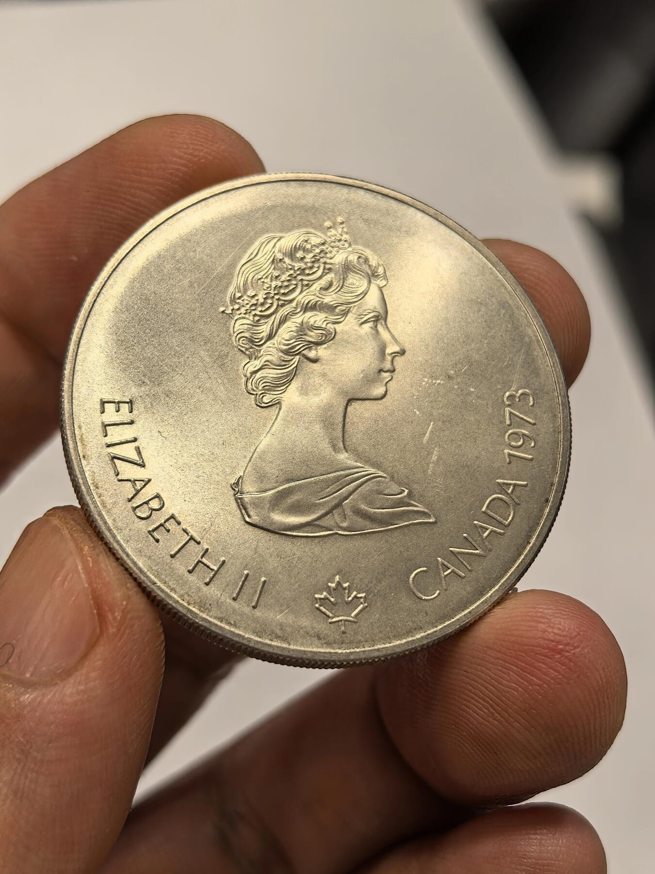 博洋堂世界钱币拍卖第146期（全场包邮） 1973年发行加拿大蒙特利尔夏季奥运会纪念银币，重24.3g UNC