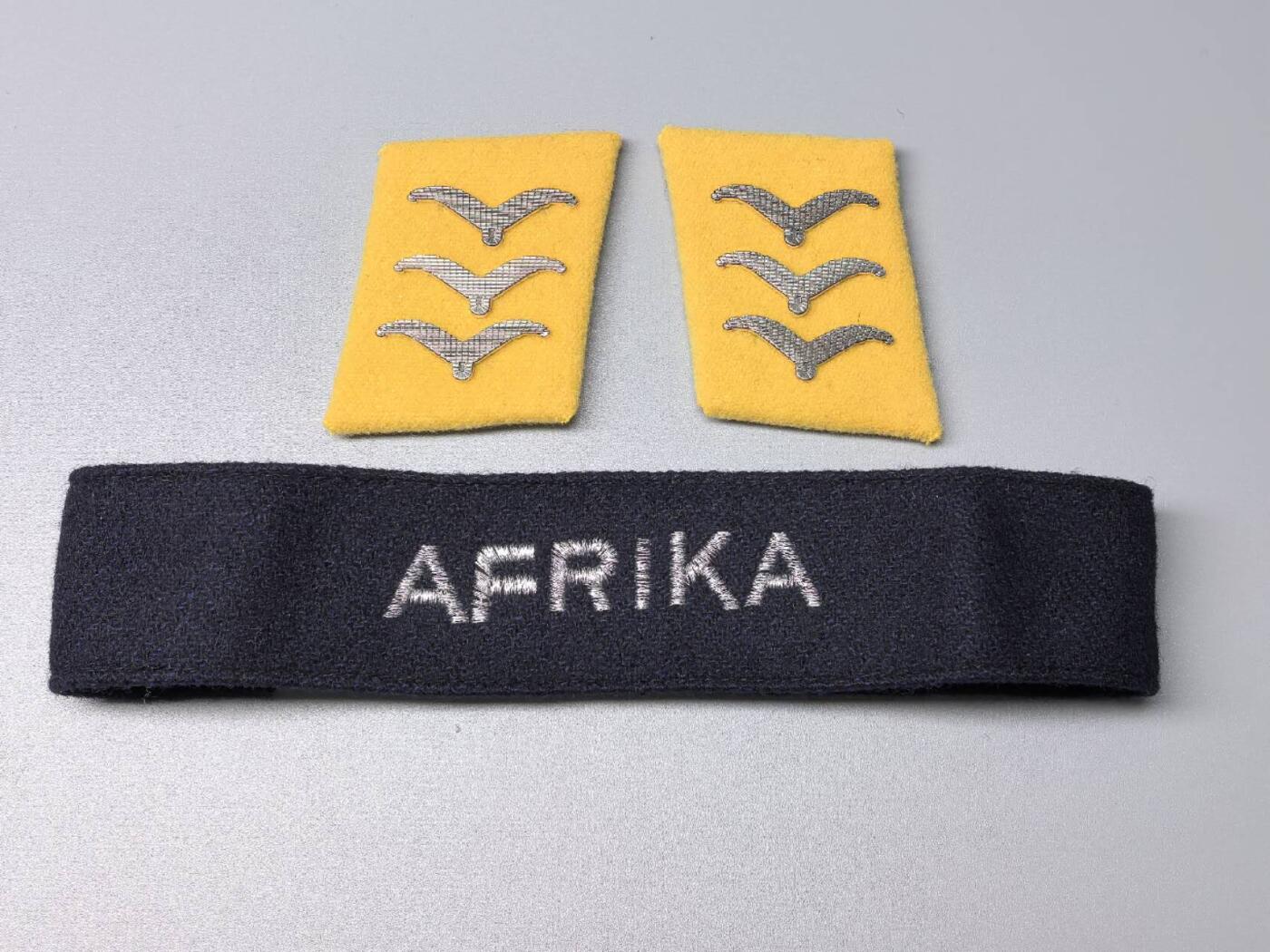 小驴勋章奖章收藏11月15日周六晚五点拍卖（珍爱和平，收藏战争，铭记历史，勿忘国耻，忠党爱国。有偿代拍，送拍规则在简介最后，参拍须阅读规则后再参拍，关系到运费包装发货时效真假辨别等关键信息，拍卖时不再发原图，看大图店主微信码在拍卖店铺介绍里） 复刻飞行员领章和AFK袖条