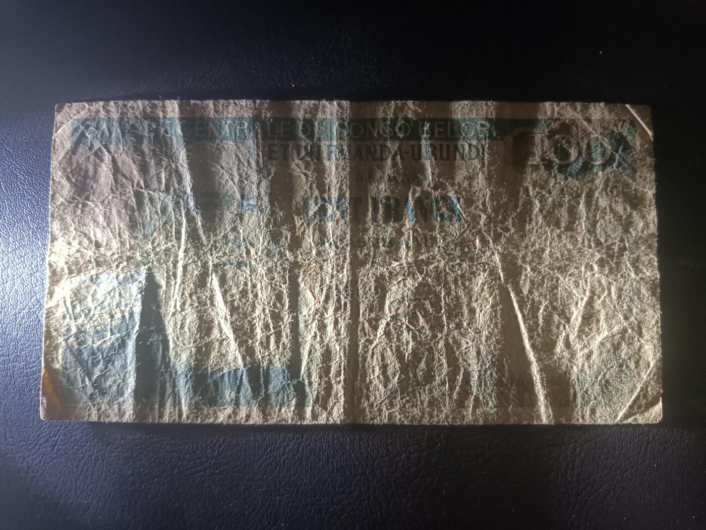 2025十一月第四期，总202期 比属刚果（现刚果金）1956年100法郎流通品相，利奥波德国王和黑人编筐