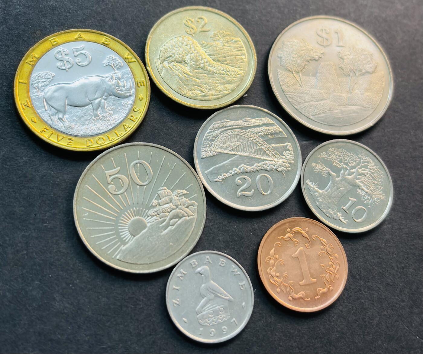 文馨钱币收藏第 281 场，【 长期接收代拍品】银元，银币，套币，纸币专场（本场截拍后休息三天，19 号发货） 少见全新津巴布韦 1 分-5 元 8 枚套币