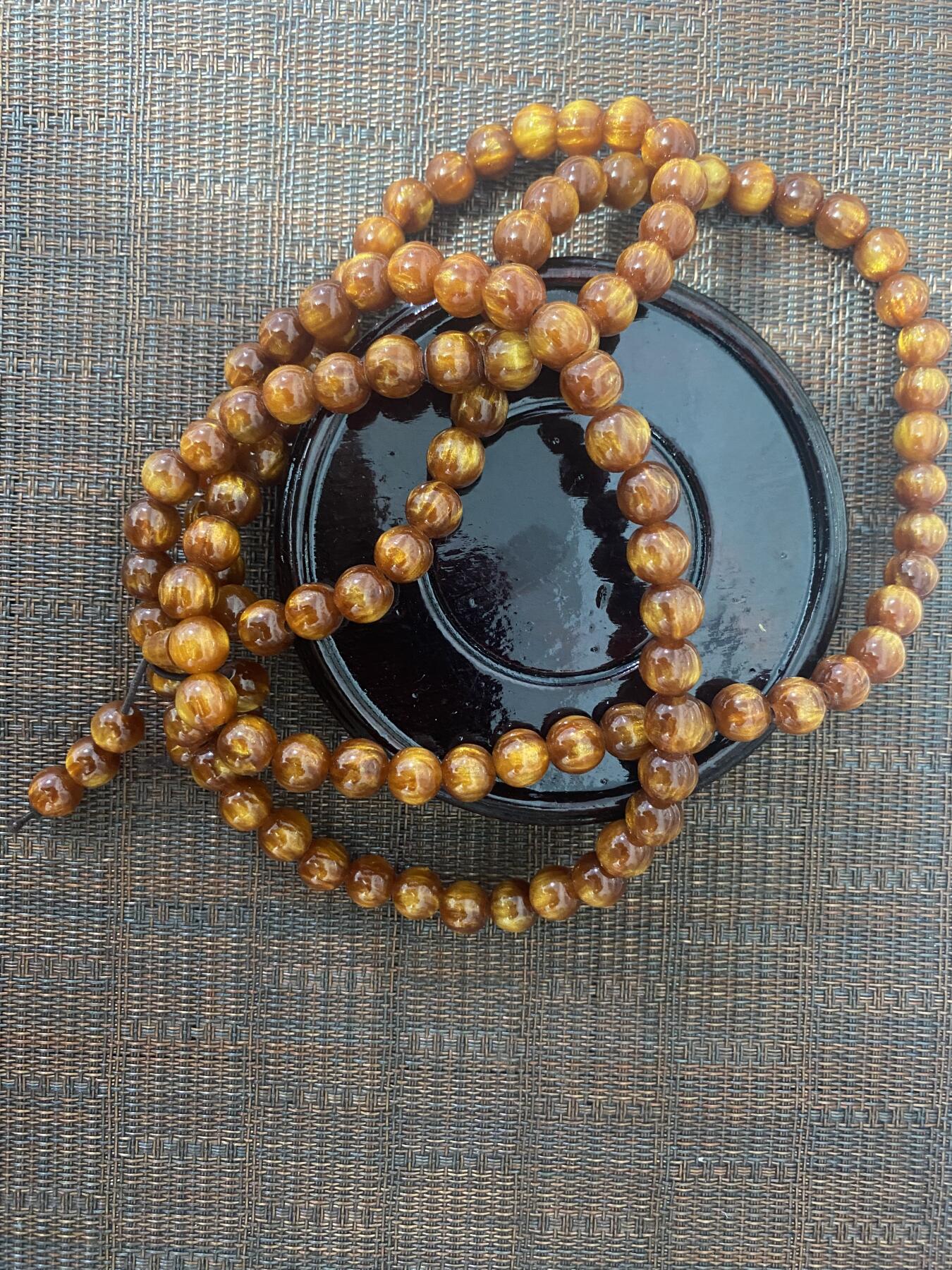 江南站杂项场 金𢇁楠木珠串