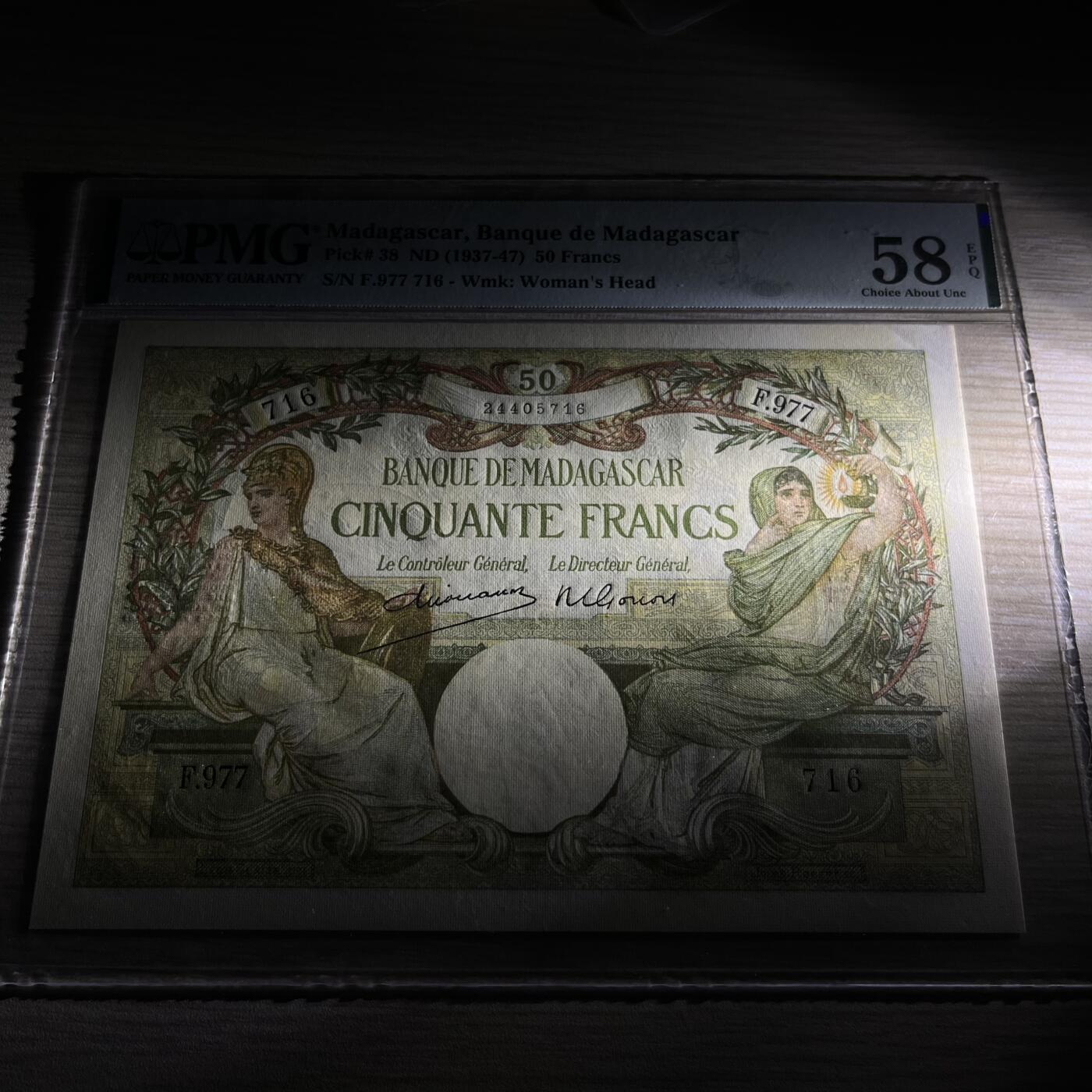【Blue Auction】世界纸币精拍第750期——18级TOP拍卖/信誉/品质/专业/高效💫   马达加斯加 1937-47年50法郎 象征智慧的月亮女神密涅瓦与象征科学的人类女性对称端坐 背面诸小智天使围绕在威严庄重的农神德墨忒尔身旁 悦目生动 PMG58EPQ （背面曾被目录和玩家广泛认为是密涅瓦或福尔图娜，实际上根据底座希腊文ΔΗΜΗΤΗΡ/Δήμητρα可知真实身份）