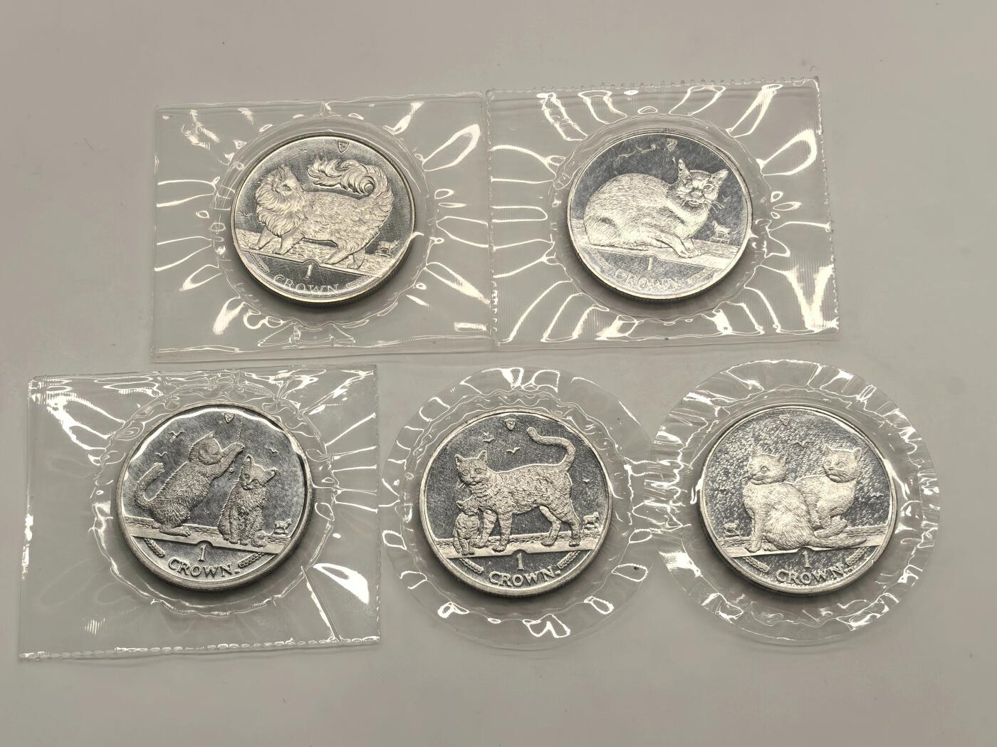 博洋堂世界钱币拍卖第146期（全场包邮） 1993、1996、2001、2002、2003年马恩岛猫铜镍币5枚一组，原厂塑封，外面的信封包装去掉了但是塑封没有打开，品相不错