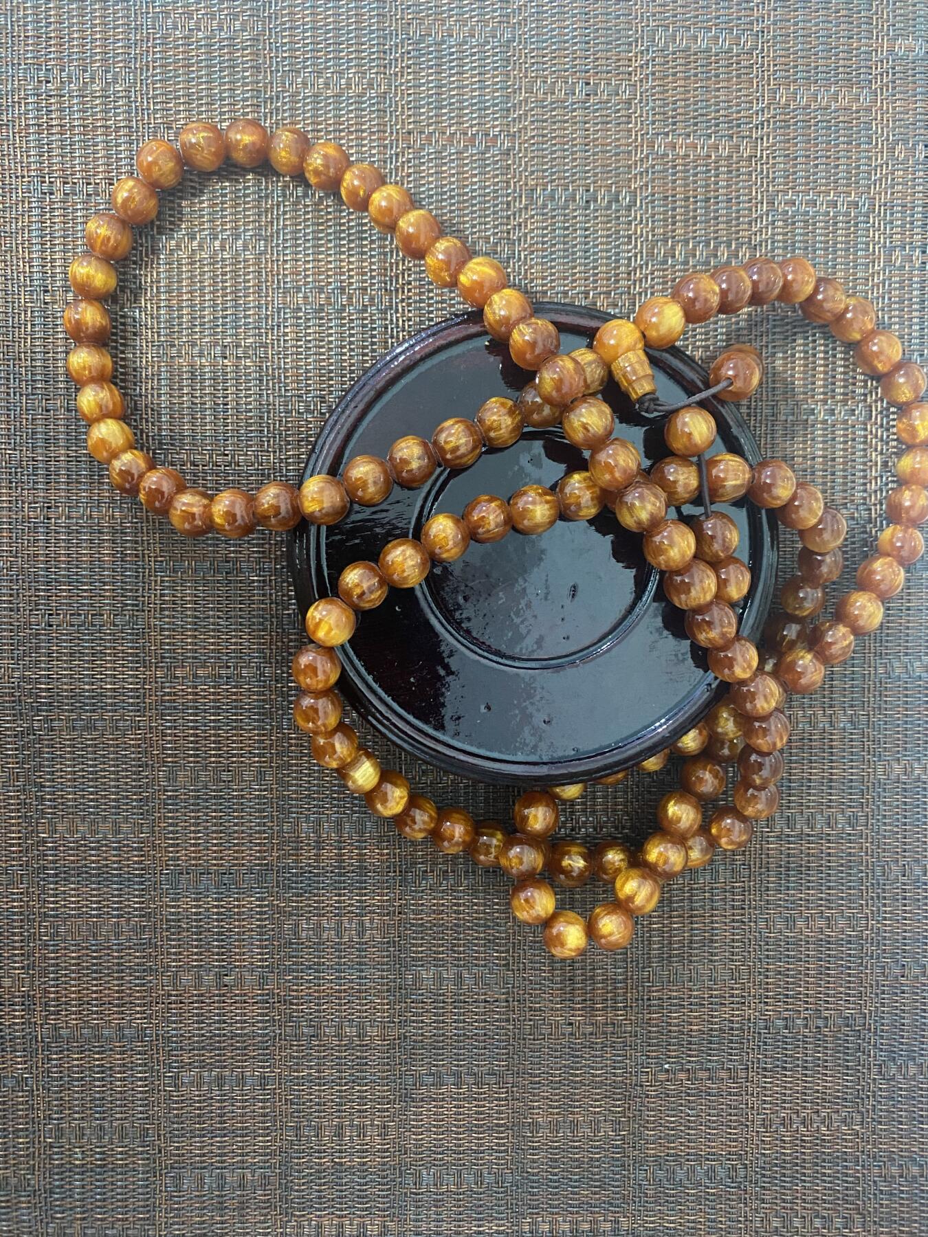 江南站杂项场 金𢇁楠木珠串