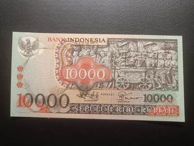 2025十一月第四期，总202期 - 印度尼西亚1975版10000卢比AUNC千位号无47，佛塔浮雕和传统工艺面具，此版本最大面值