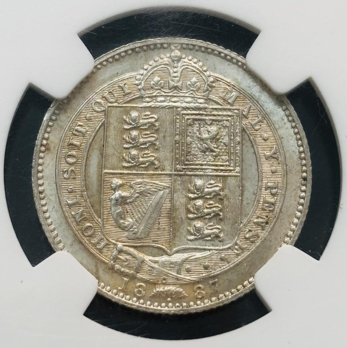 文馨钱币收藏第 281 场，【 长期接收代拍品】银元，银币，套币，纸币专场（本场截拍后休息三天，19 号发货） 稀少 1887 年英国维多利亚 1 先令银币，NGC 评级 MS63 分，此拍为一对 2 枚，喜欢的老板大胆出价，这品相不多见了