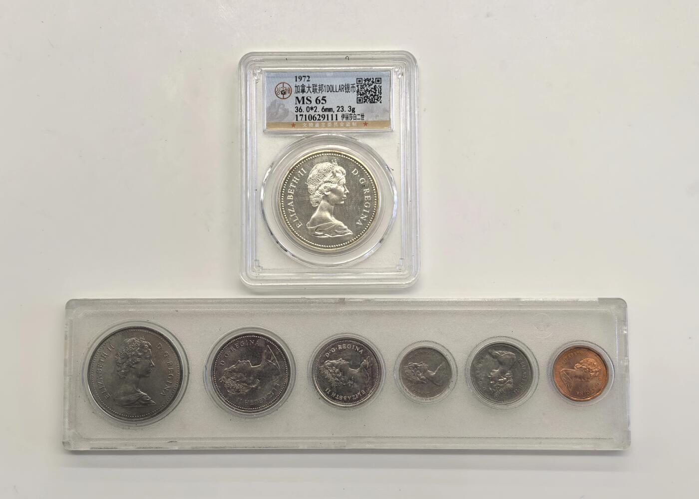 博洋堂世界钱币拍卖第146期（全场包邮） 公博 MS65 加拿大1972年划船一加元银币+加拿大建国一百周年原厂封装纪念硬币一组六枚，银币重23.3克，精制原光镜面状态，若砸盒送评PCGS或NGC，极可能出分MS64+PL，出分标准器