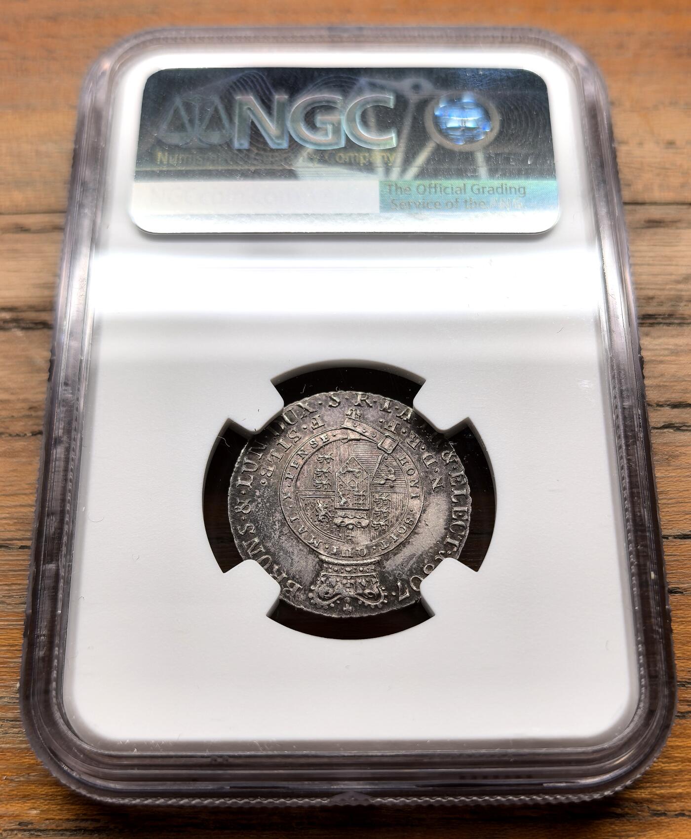 泉海漫舟·凡希社世界钱币微拍第三百十四期 1807德国不伦瑞克汉诺威乔治三世1/6泰勒银币NGC-MS62，紫金包浆，罕见面值。