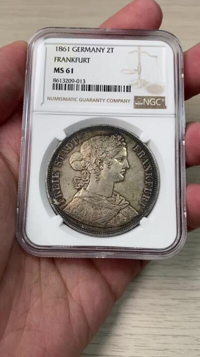 万国钱币拍卖第055期 NGC MS61 1861年德国法兰克福少女流通2泰勒 经典法兰城少女2T 欧陆深五彩转光 状态极度舒适