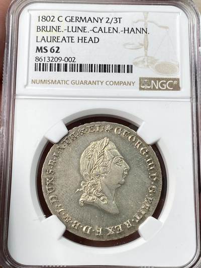 万国钱币拍卖第055期 - NGC MS62 1802年英国共主德国布伦瑞克-吕讷堡-卡伦堡-汉诺威乔治三世2/3泰勒大银币 除了有强烈的喷砂感外高点也近乎完美 淡金色环彩非常漂亮