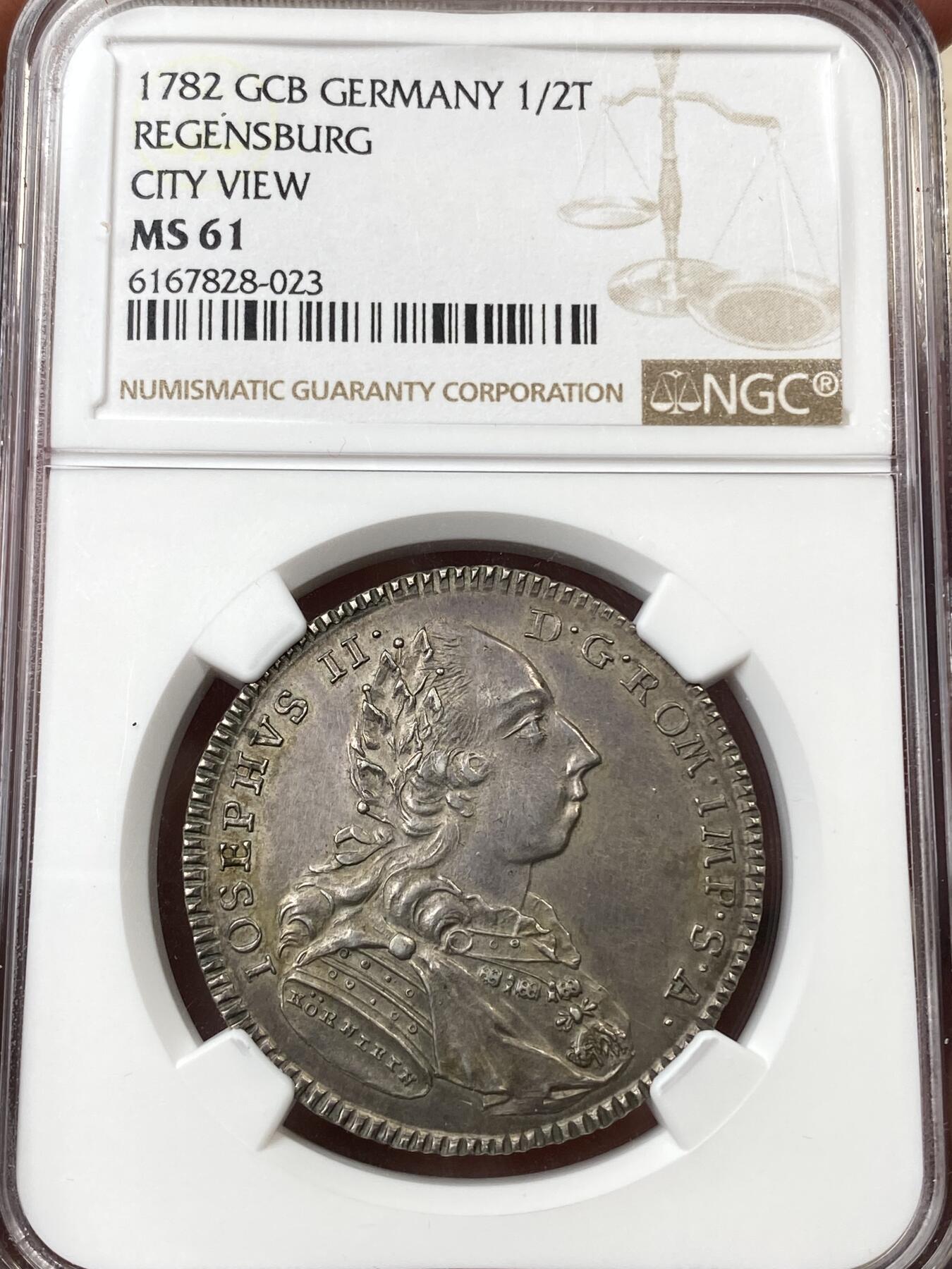 万国钱币拍卖第055期 NGC MS61 1782年德国雷根斯堡自由市1/2景观泰勒 正面为神圣罗马帝国皇帝约瑟夫二世 全深打原味景观极其难得 高点细节极佳 原味欧陆包浆收藏级