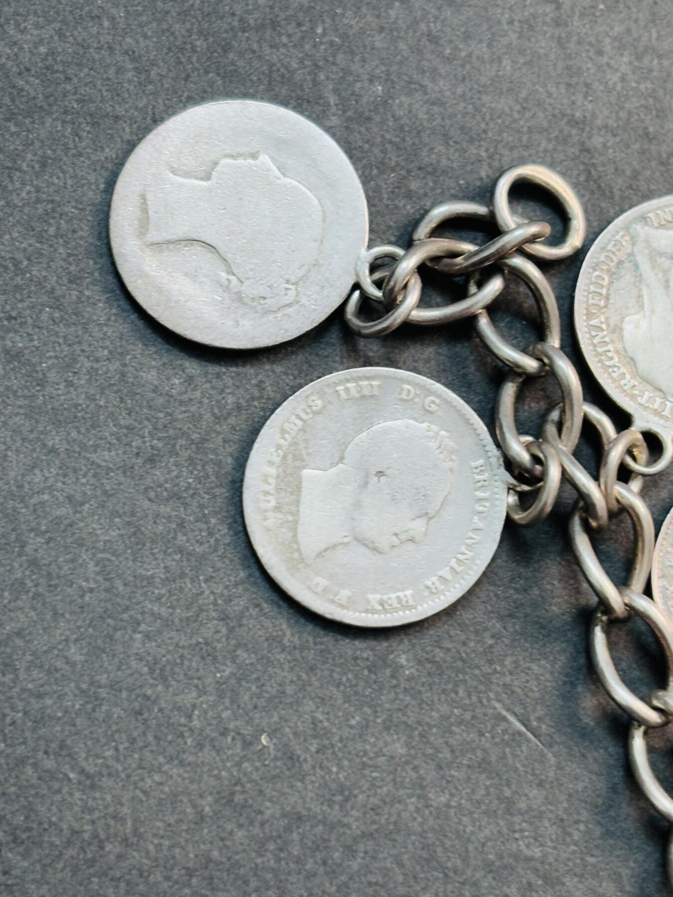 文馨钱币收藏第 281 场，【 长期接收代拍品】银元，银币，套币，纸币专场（本场截拍后休息三天，19 号发货） 少见英国银币手链，威廉四世，维多利亚，爱德华七世，乔治五世，均为 925 高银，链子也是银的，共计 23 克