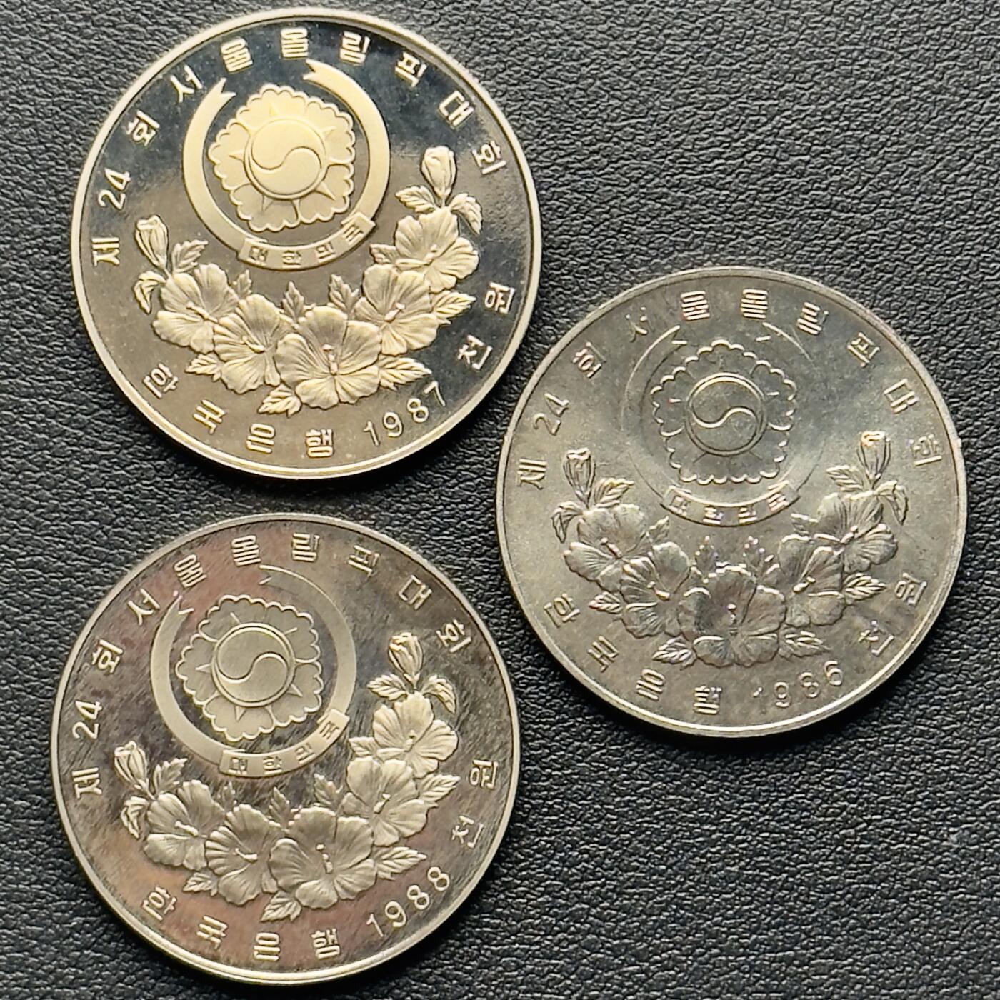 ＜小葵钱铺＞第65期·散币·银币场·满200包邮，不寄存·17号发货 韩国1986-1988年汉城奥运会1000元纪念币3枚（2精制，1普制）