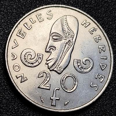 泉币菌-第129场-精品福利场（本场拍品多，请提前出价） - 带光 法属新赫布里底1975年20法郎 面具 加字版 镍币 外国硬币 28.3mm