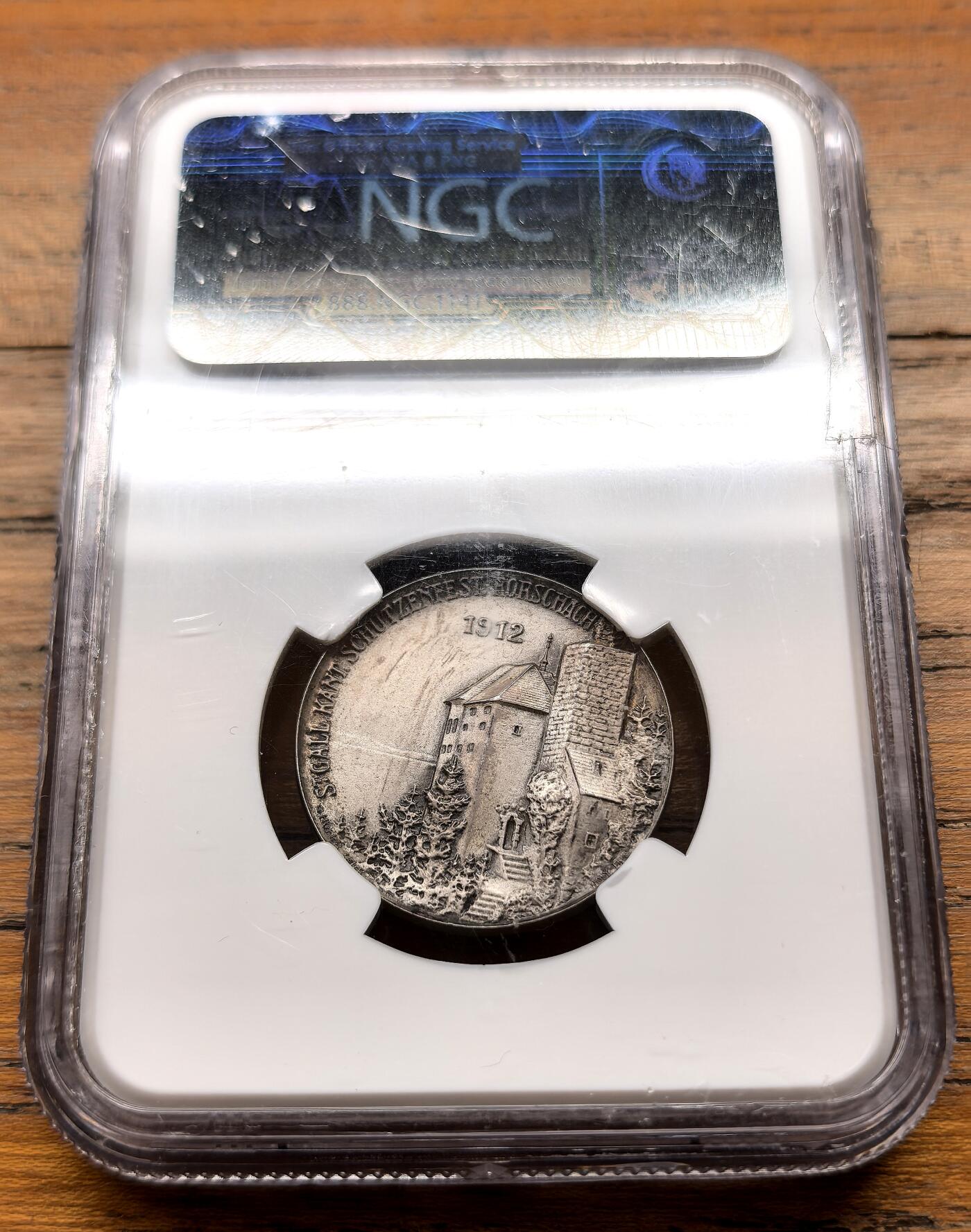 泉海漫舟·凡希社世界钱币微拍第三百十四期 1912瑞士圣加仑-罗夏射击节纪念银章NGC-MS62，精美。