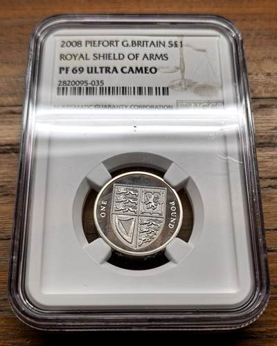 泉海漫舟·凡希社世界钱币微拍第三百十四期 - 2008英国皇家盾徽1镑加厚银币NGC-PF69UC