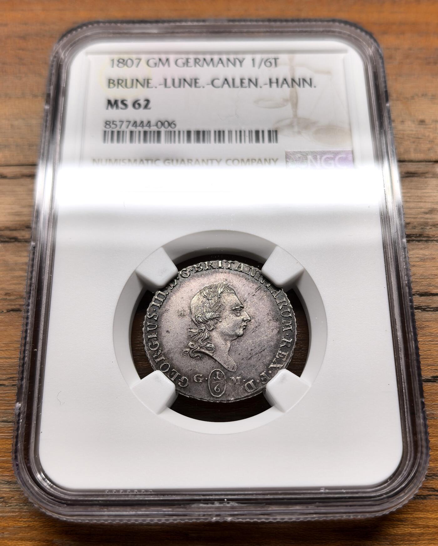 泉海漫舟·凡希社世界钱币微拍第三百十四期 1807德国不伦瑞克汉诺威乔治三世1/6泰勒银币NGC-MS62，紫金包浆，罕见面值。