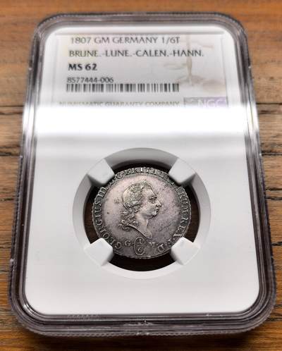泉海漫舟·凡希社世界钱币微拍第三百十四期 - 1807德国不伦瑞克汉诺威乔治三世1/6泰勒银币NGC-MS62，紫金包浆，罕见面值。