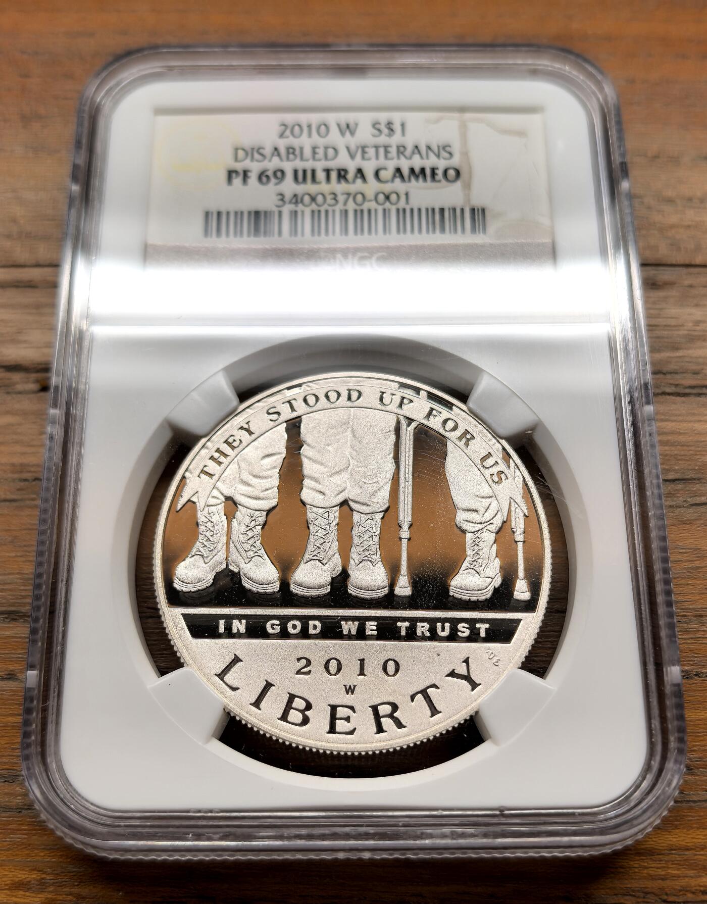 泉海漫舟·凡希社世界钱币微拍第三百十四期 2010美国战争残疾军人纪念Dollar大银精铸NGC-PF69UC