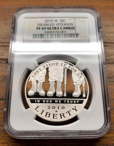 泉海漫舟·凡希社世界钱币微拍第三百十四期 - 2010美国战争残疾军人纪念Dollar大银精铸NGC-PF69UC