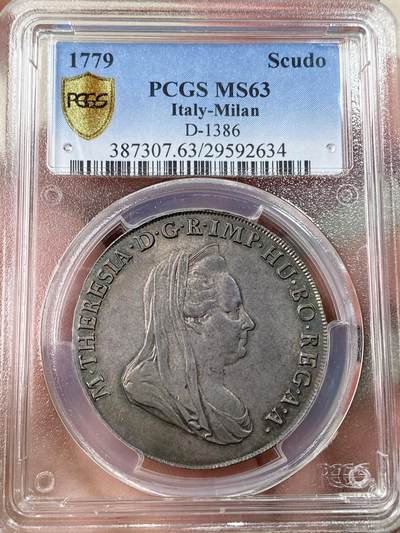 万国钱币拍卖第055期 - PCGS MS63 1779意大利米兰公国玛丽亚·特蕾莎女皇Scudo（6里拉）大银 神圣罗马帝国时期哈布斯堡家族统治下的产物 特蕾莎女皇是查理六世的女儿，也是后来两位神罗皇帝约瑟夫二世和利奥波德二世的母亲，背面为米兰公国经典的鹰蛇纹章，此品种常见多为vf品相，均匀欧陆五彩转光，PC唯一冠军分&封面广告币，一共只有四枚评级记录，亚军AU53，季军VF35，断崖式领先的顶级收藏品质。