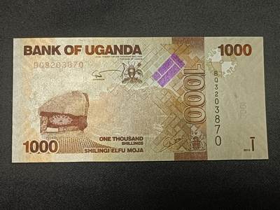 【游宝拍卖】乙巳蛇年86期  - 乌干达-1000先令【2013年 全新UNC】