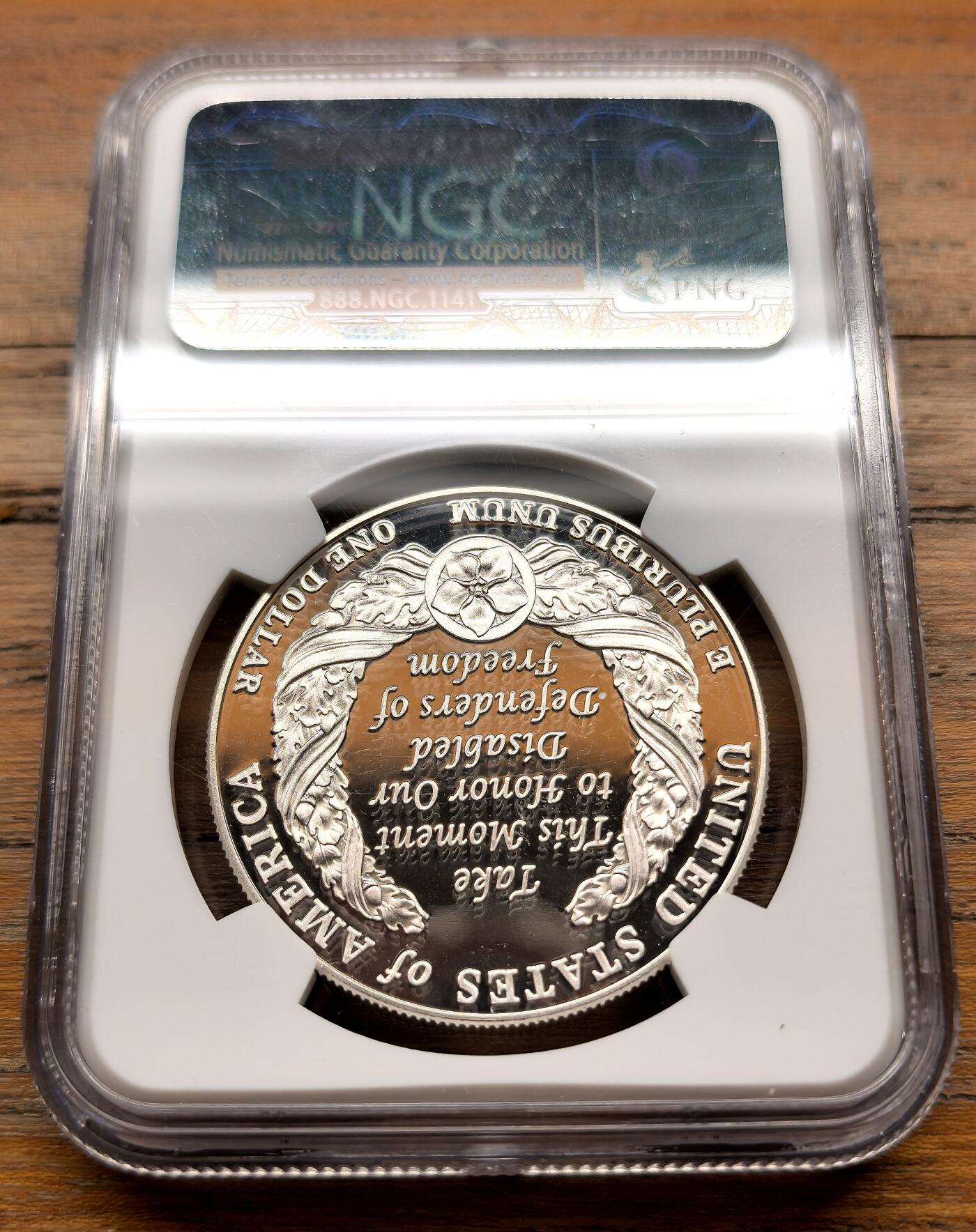 泉海漫舟·凡希社世界钱币微拍第三百十四期 2010美国战争残疾军人纪念Dollar大银精铸NGC-PF69UC