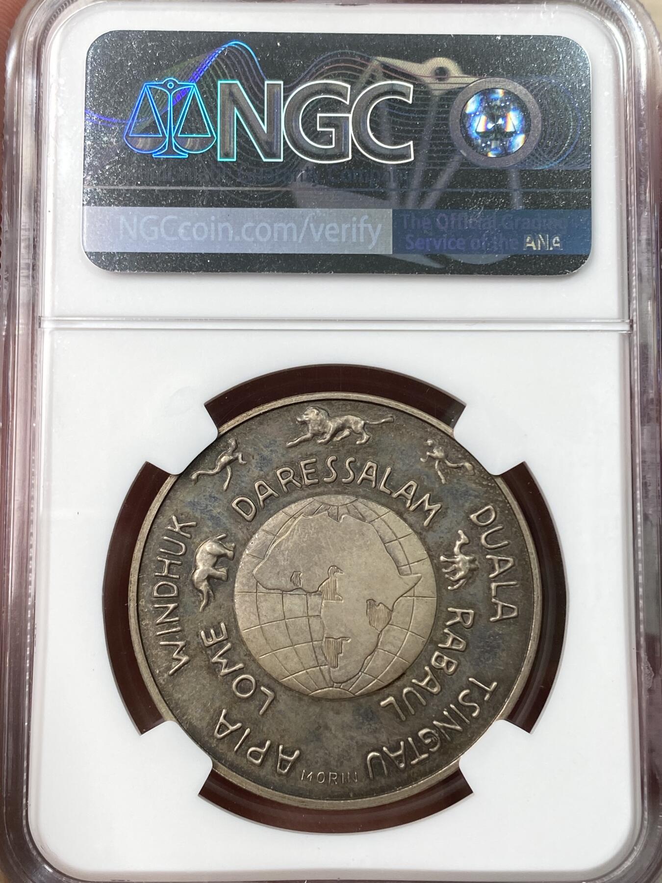 万国钱币拍卖第055期 NGC PF66CAM 1933年德国民族社会主义工人党纪念帝国殖民地50周年精致银章 顶奢深度镜面精致唯一冠军分 背面一圈为当时帝国殖民地所在地 其中包含中国青岛 原味天鹅绒彩