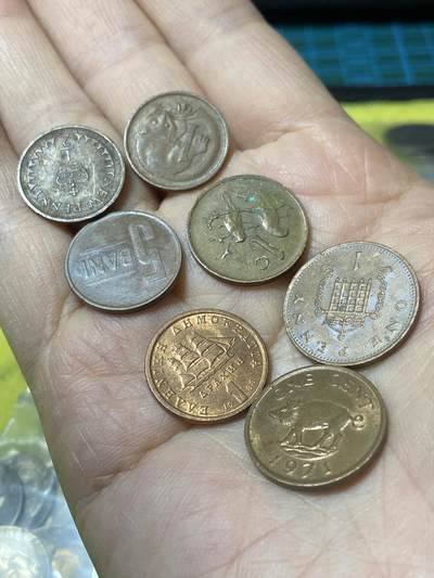 2025年第一百二十九场(总第一百五十五场）外国邮票、散币场(免佣金) - 各国散币7枚：百慕大🇧🇲1971年1分，英国🇬🇧1984年1便士，希腊🇬🇷1988年1德拉克马，南非🇿🇦1974年1分，罗马尼亚🇷🇴2014年5巴尼，澳大利亚🇦🇺1976年1分，英国🇬🇧1973年1/2新便士