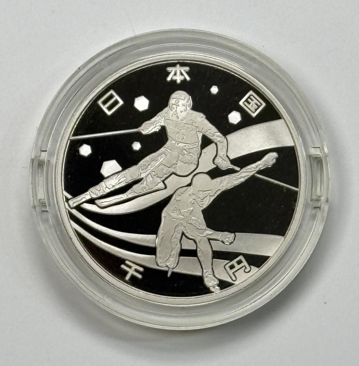 S&S Numismatic世界钱币-拍卖 第115期  日本2010年 青森亚冬运动会 1000円精制纪念银币 官方壳装 31.1克999银