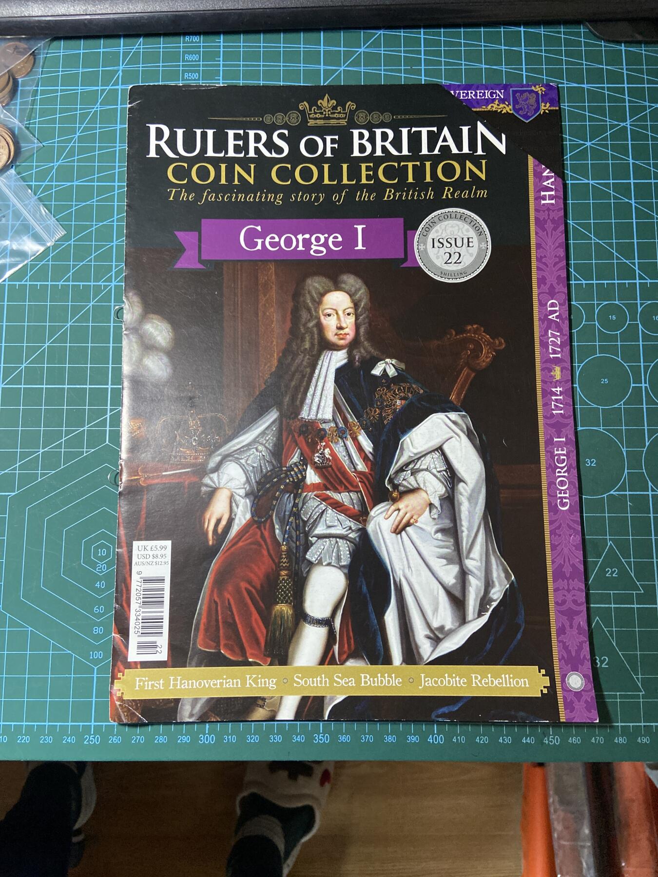 2025年第一百二十九场(总第一百五十五场）外国邮票、散币场(免佣金) （英国统治者硬币收藏系列）的第22期藏品杂志，乔治一世主题
