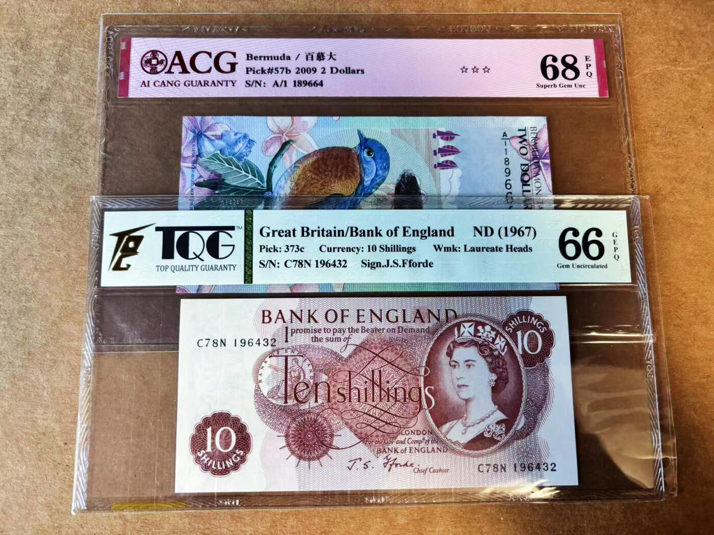 【Blue Auction】世界纸币精拍第751期——18级TOP拍卖/信誉/品质/专业/高效💫  【一组2张】百慕大 2009年2元 蓝鸟 获奖钞 A/1冠 ACG68EPQ&英国 1967年10先令 TQG66EPQ 