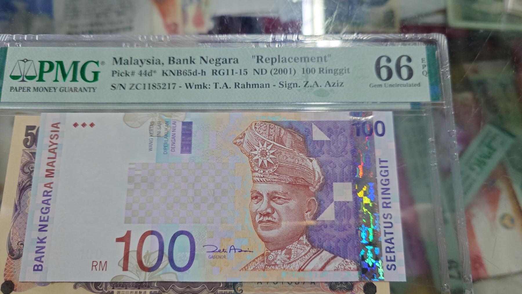 世界钱币～微拍第215期暨2025年第55期  双11评级币特惠拍第二场 2001年马来西亚100林吉特 补号ZC全程无4PMG66E尾号217
