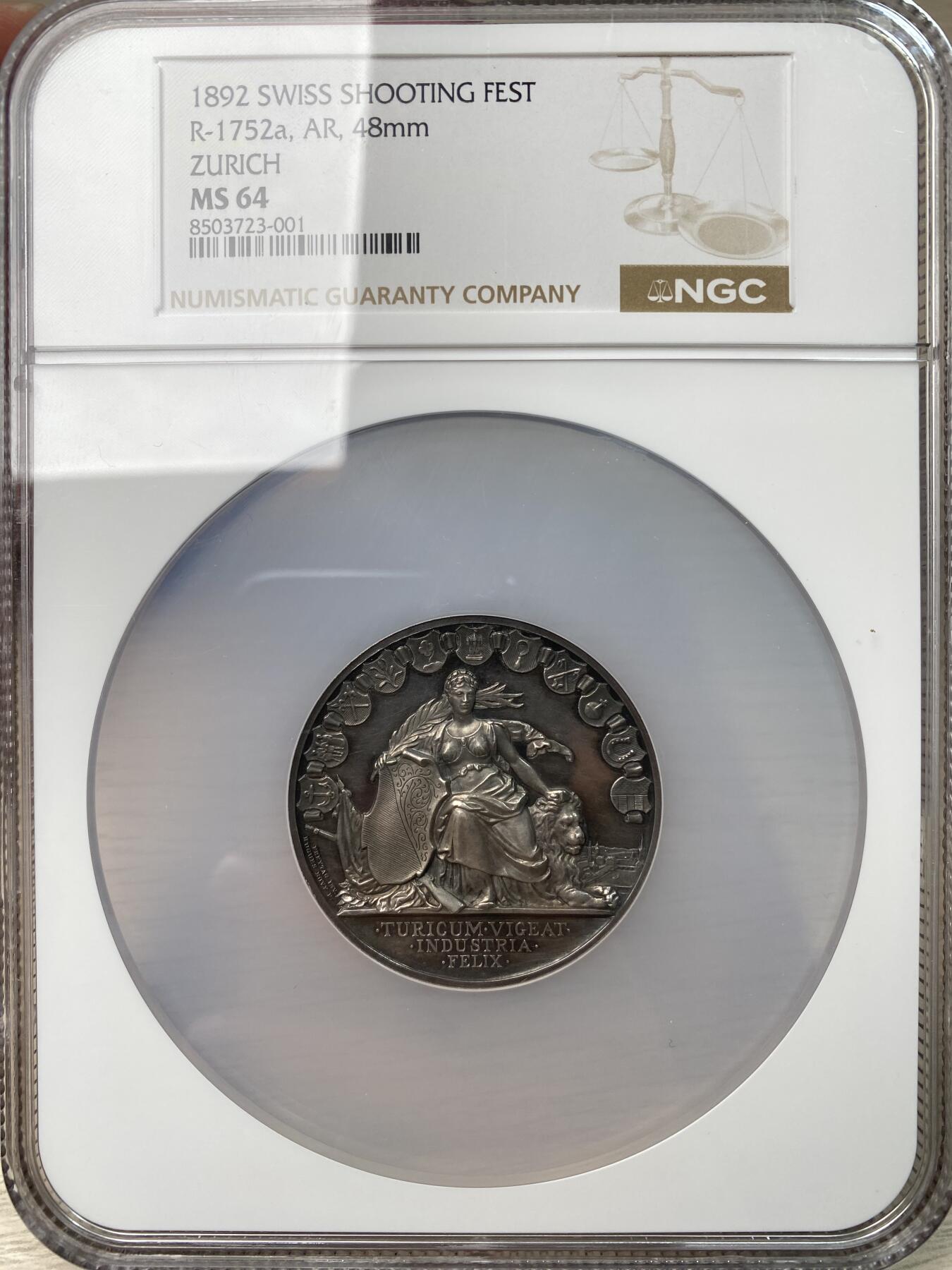 万国钱币拍卖第055期 NGC MS64 1892年瑞士联邦苏黎世射击节纪念大银章 瑞射名品之一 罕见品种瑞士女神与雄狮在苏黎世城市景观前 苏黎世盾徽超高浮雕雄伟无敌 巨型瑞射名誉品种 NGC唯一冠军分