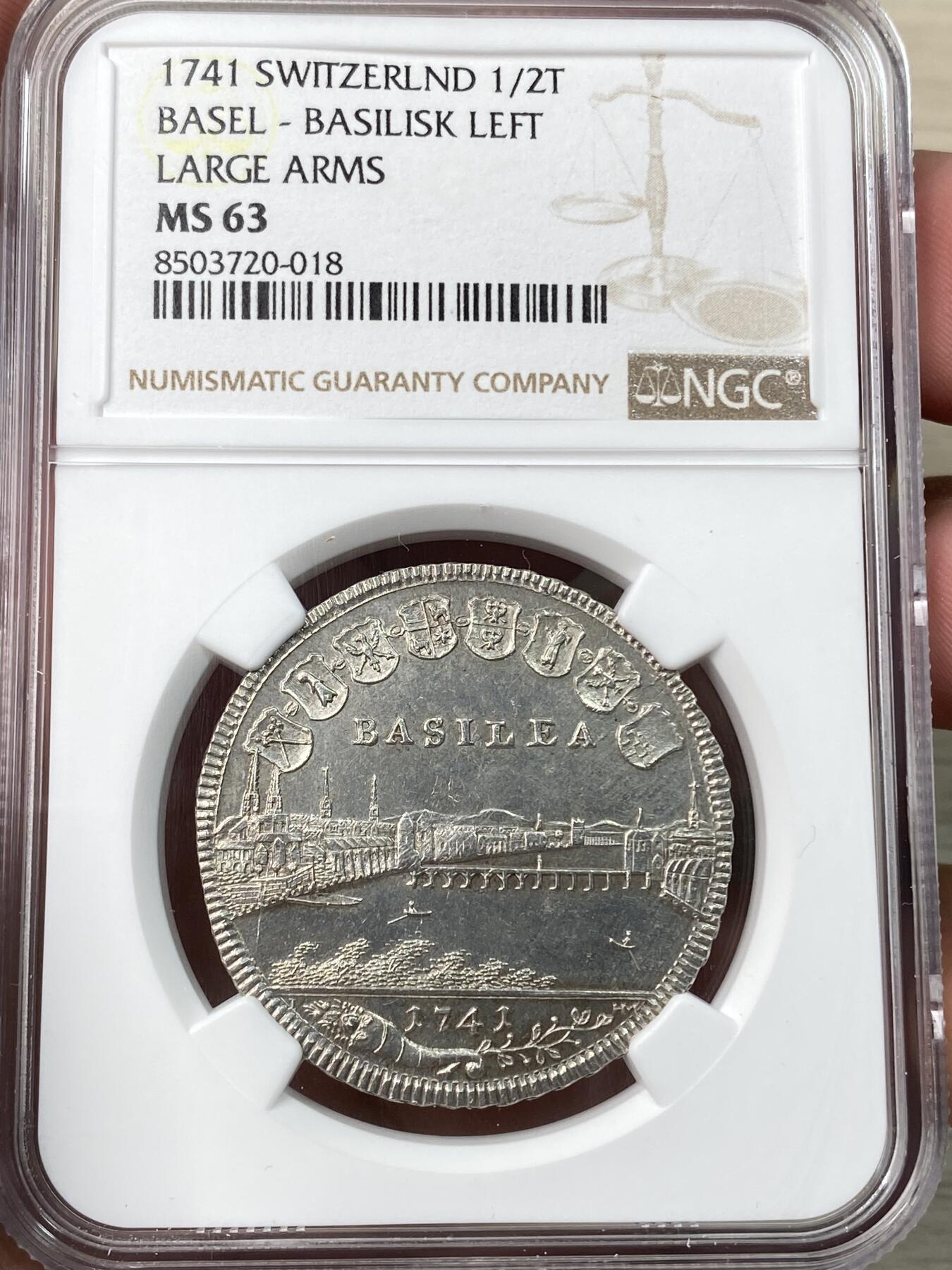 万国钱币拍卖第055期 NGC MS63 1740年瑞士巴塞尔景观1/2半泰勒 经典瑞士景观品种 银霜全深打极其难得 巴塞尔怪兽巴西利斯克身上的鳞片粒粒可数 城市细节一览无余 顶级收藏状态